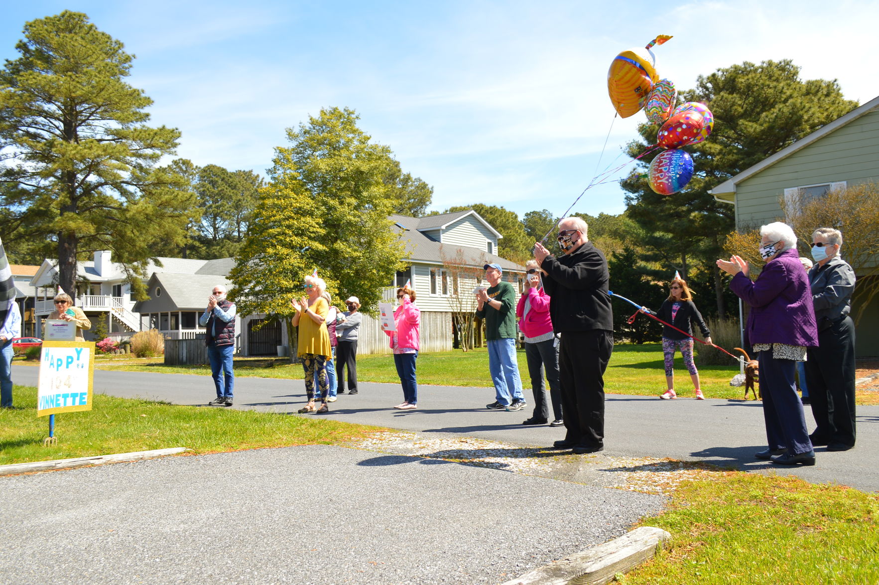 Neighbors sing Happy Birthday